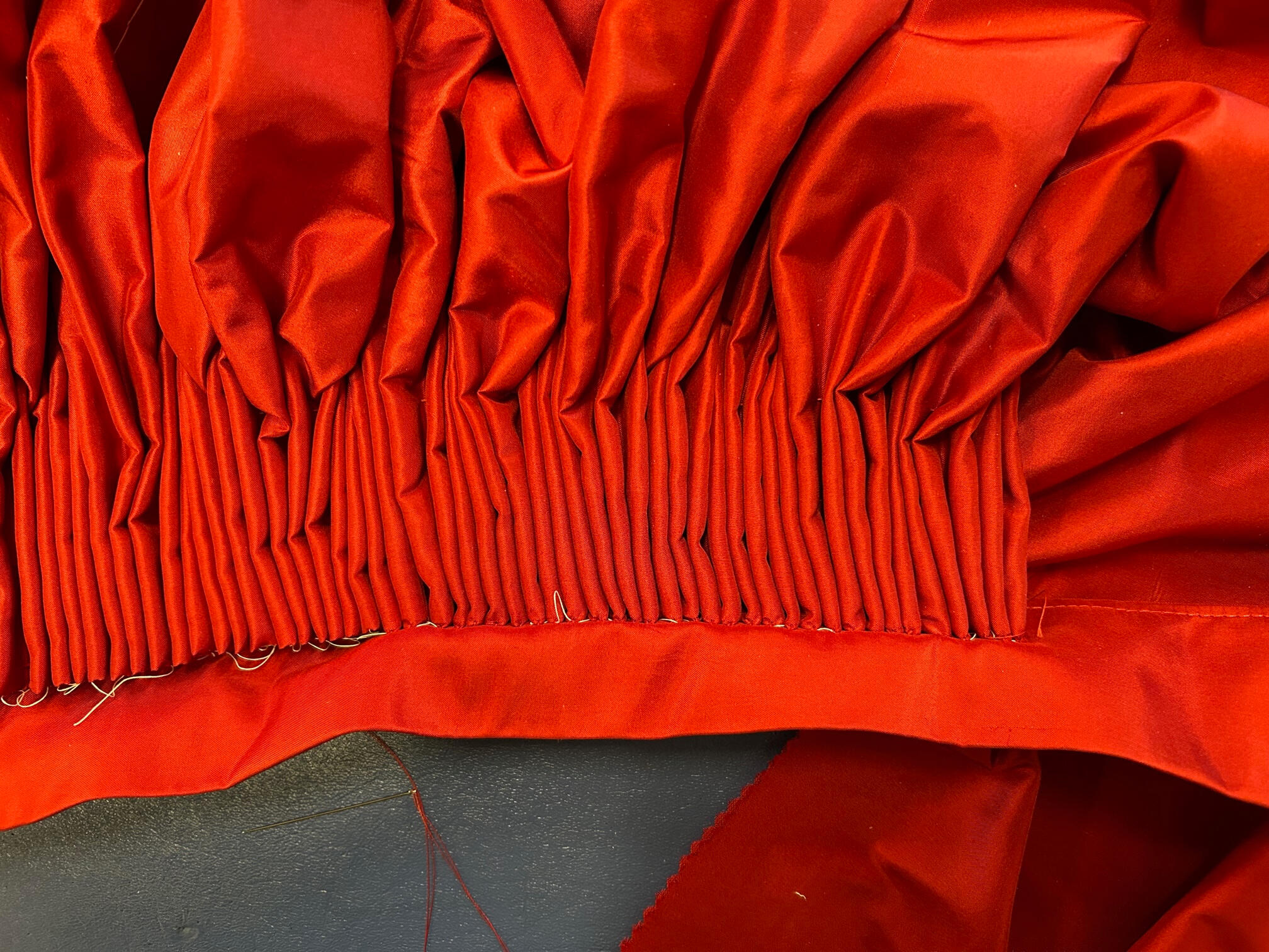 Cartridge pleats for one of the Emilia's, 2023. Photo Credit: Eleonore MacZura